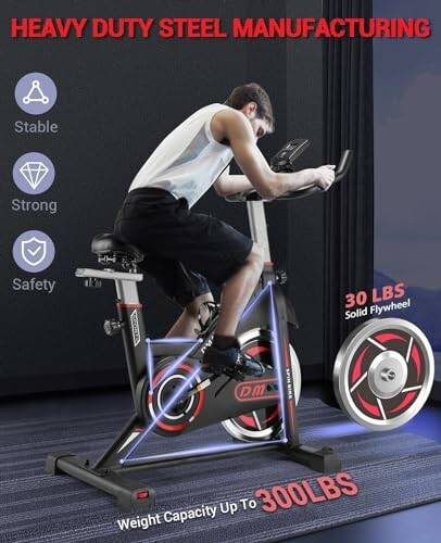 Person using a heavy-duty exercise bike with 30 lbs flywheel and 300 lbs weight capacity.