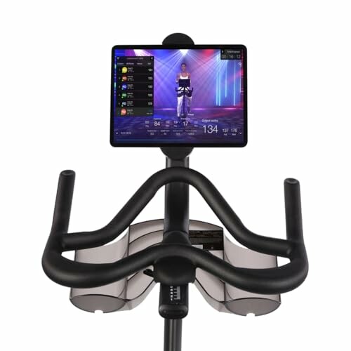 Exercise bike monitor with fitness program display.