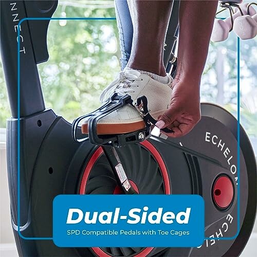 Person securing foot on exercise bike pedal with toe cage