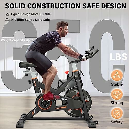 Man using an indoor cycling bike with a weight capacity of 350 lbs, showing stability, strength, and safety features.