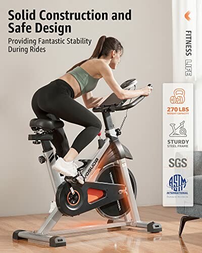 Woman using an indoor exercise bike with solid construction and safe design.