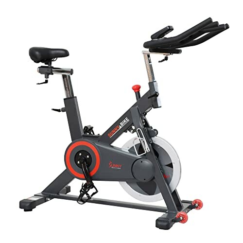 Indoor stationary exercise bike with adjustable seat and handlebars.