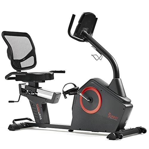 Recumbent exercise bike with adjustable seat and digital display.